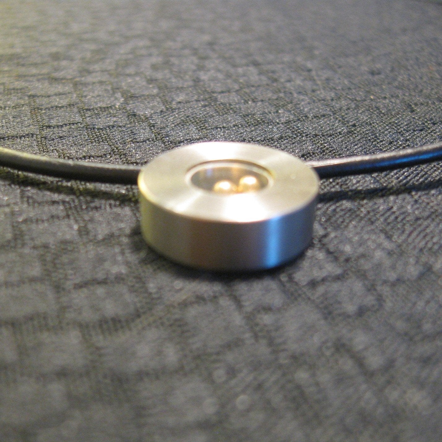 Titanium Pendant on a black Leather Cord - NIB