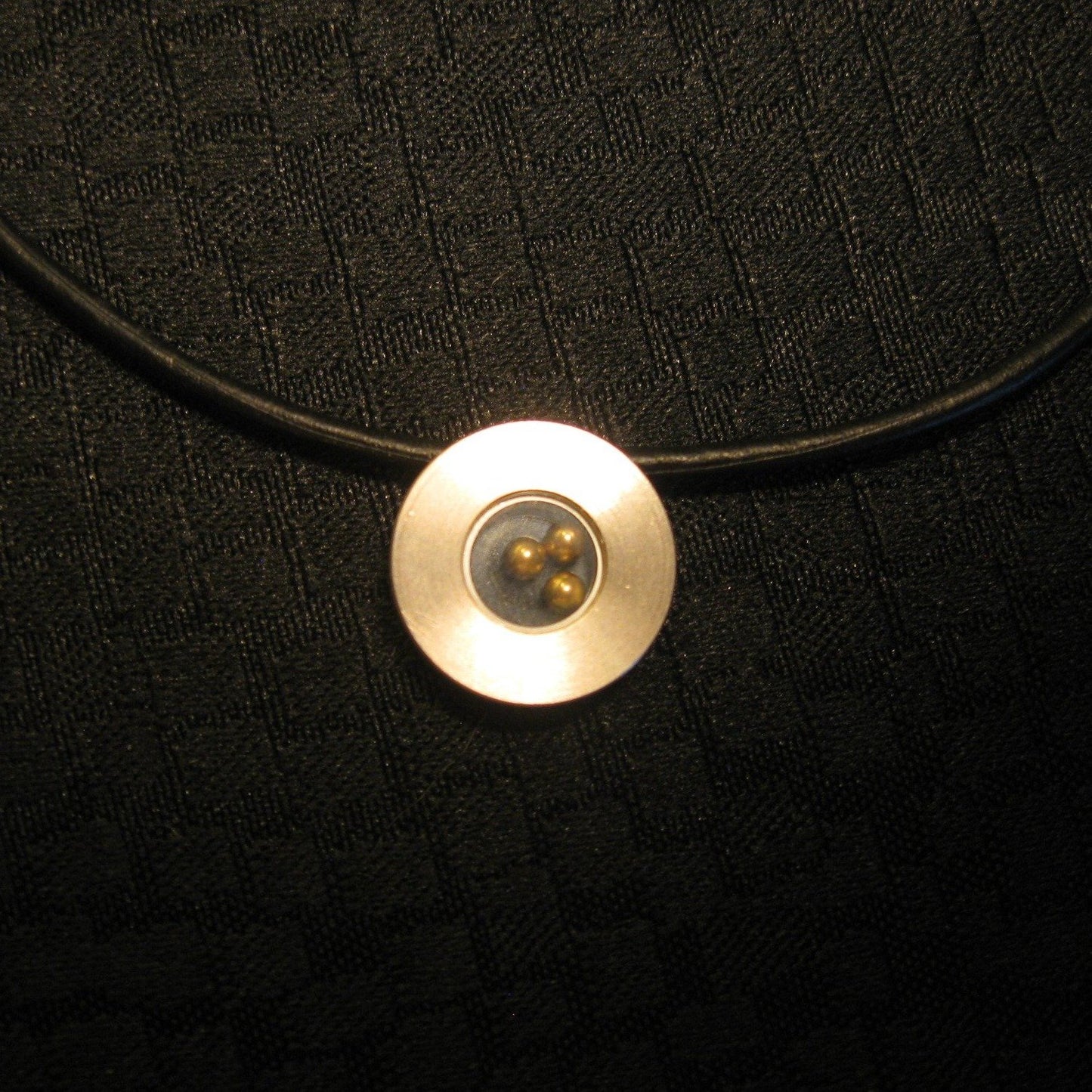 Titanium Pendant on a black Leather Cord - NIB