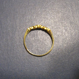 10k yellow Gold Ring with 5 Dark Blue Stones bezel set in Hearts.