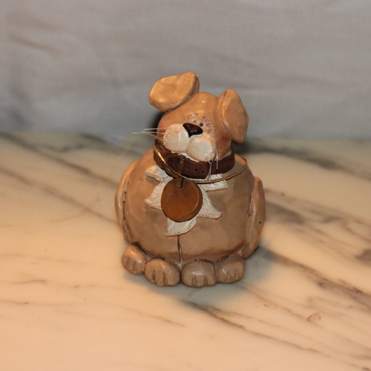 Blossom Bucket Dog figurine - beige 3 1/2" tall