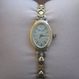 14k y Gold Bulova Ladies Diamond set Watch model 95U00